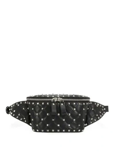 Shop Valentino Garavani Small Rockstud Spike Leather Belt Bag In Black