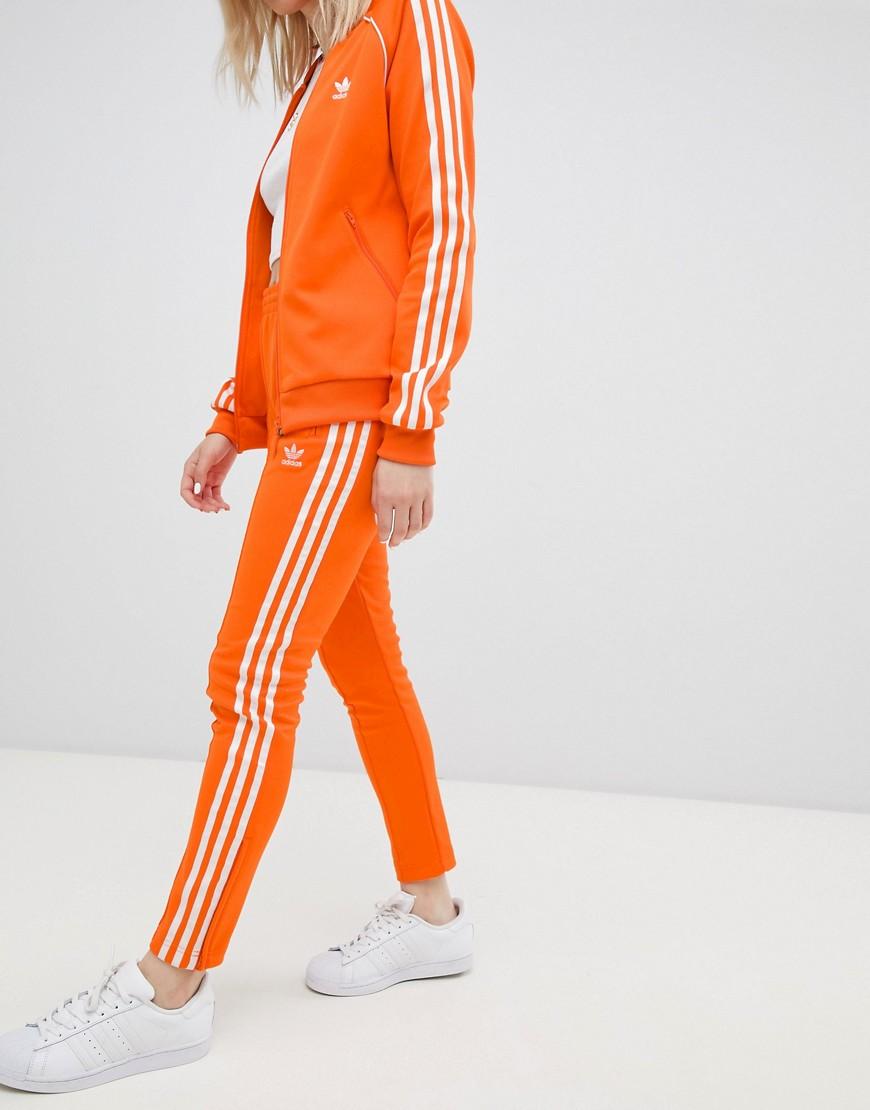 adidas originals three stripe cigarette pants in black