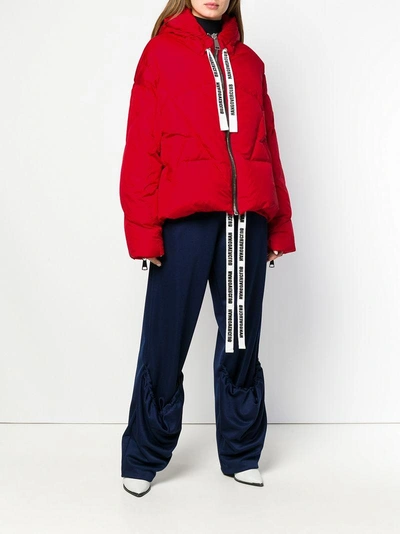 Shop Khrisjoy Logo Tape Puffer Jacket In Red