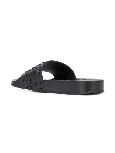 Shop Jimmy Choo Star Studded Slides In Black