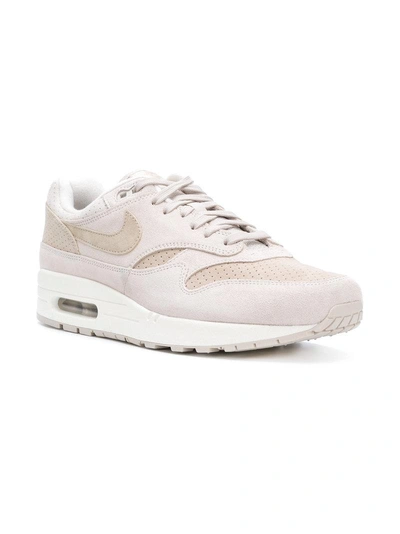 Shop Nike Air Max 1 Premium Sneakers - Pink