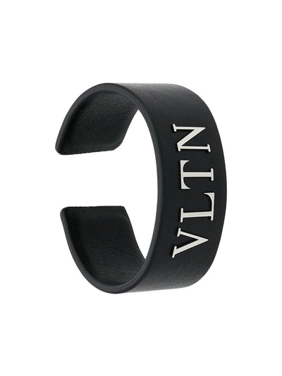 Shop Valentino Garavani Logo Cuff Bracelet - Black