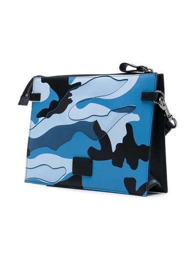 Shop Valentino Garavani Camouflage Clutch - Blue