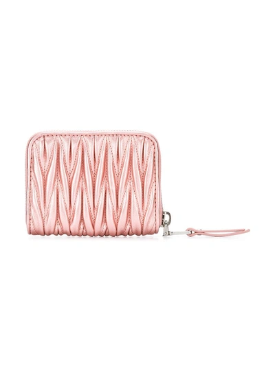 Shop Miu Miu Chevron Pleated Textured Wallet - Pink