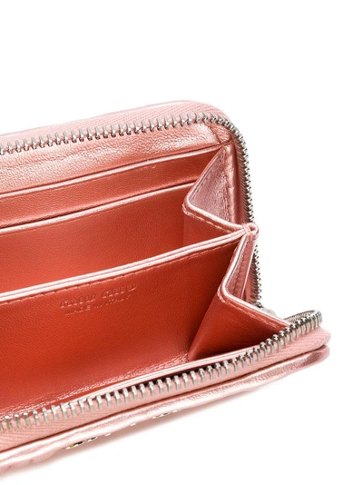 Shop Miu Miu Chevron Pleated Textured Wallet - Pink