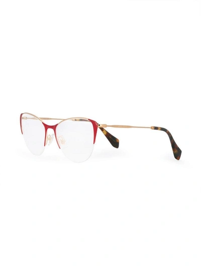 Shop Miu Miu Eyewear Cat Eye Frame Glasses - Red