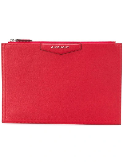 Shop Givenchy Pouch Clutch In Red