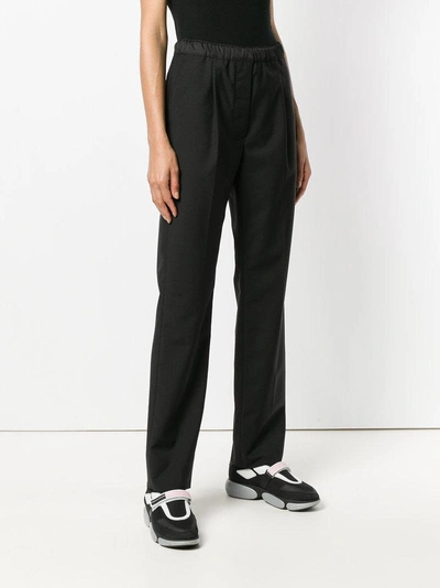 Shop Prada Elasticated Waistband Straight Trousers - Black