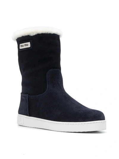 Shop Miu Miu Shearling Snow Boots - Blue