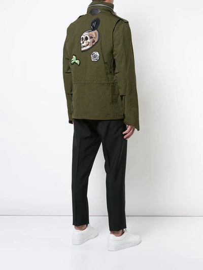 Shop Coach X Disney Skull M65 Jacket In Green