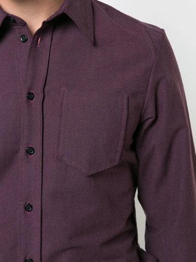 longsleeved buttoned shirt