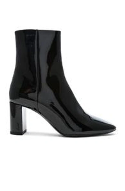 Shop Saint Laurent Patent Leather Pin Lou Ankle Boots In Black