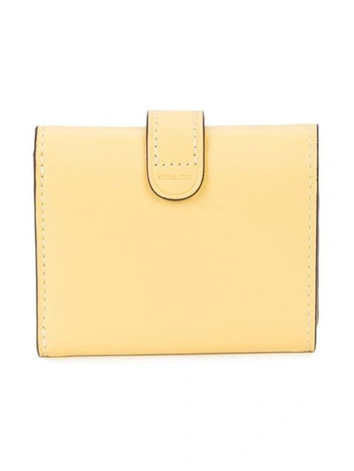 Shop Coach Floral-print Trifold Wallet - Yellow