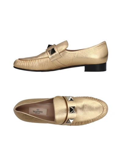 Shop Valentino Loafers In Gold