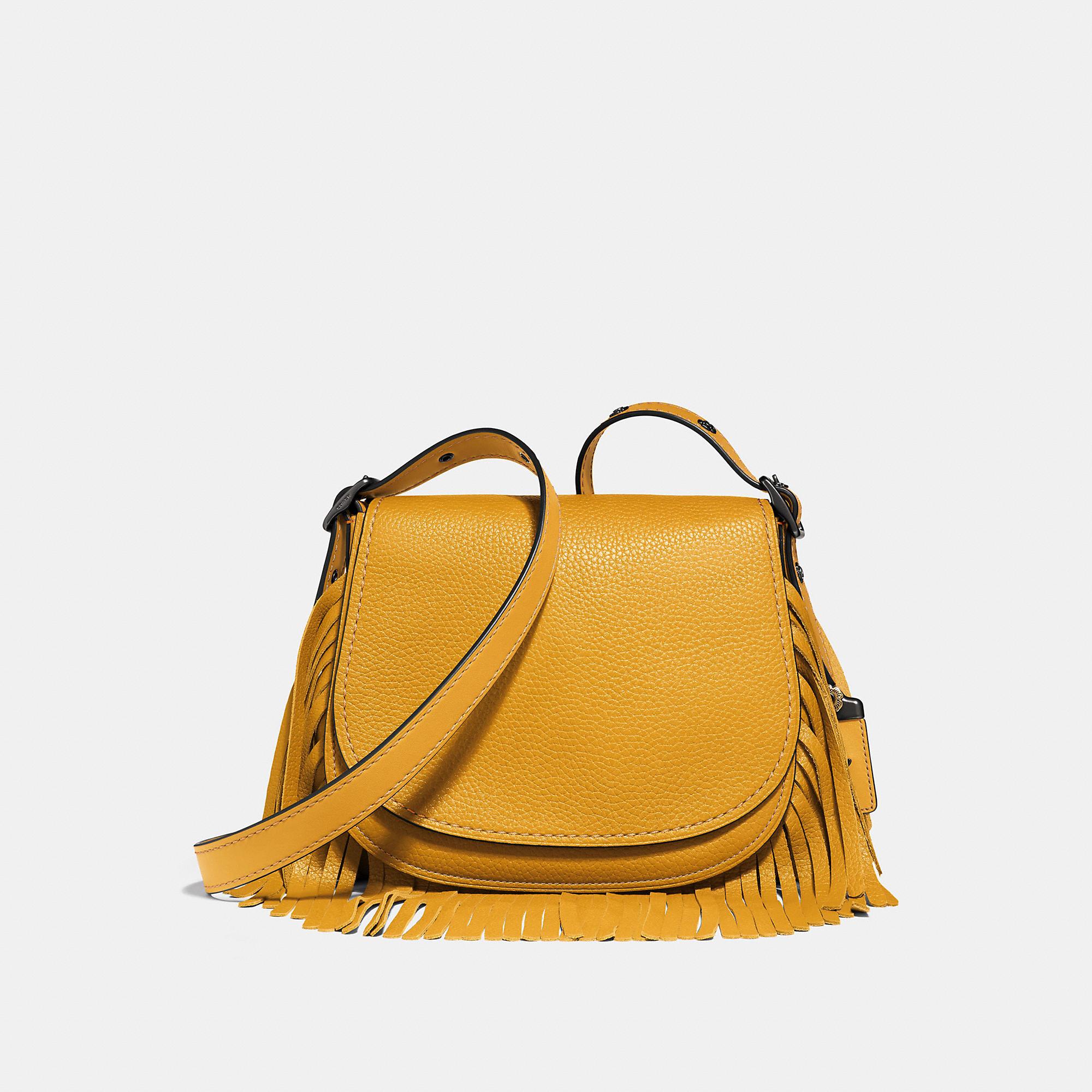 coach fringe saddle bag