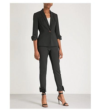 Shop Ted Baker Bow-embellished Mid-rise Skinny Woven Trousers In Black