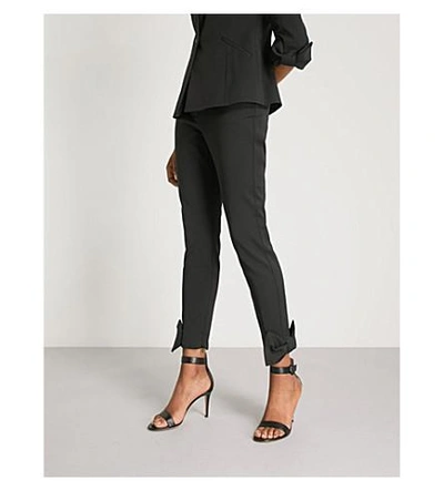 Shop Ted Baker Bow-embellished Mid-rise Skinny Woven Trousers In Black