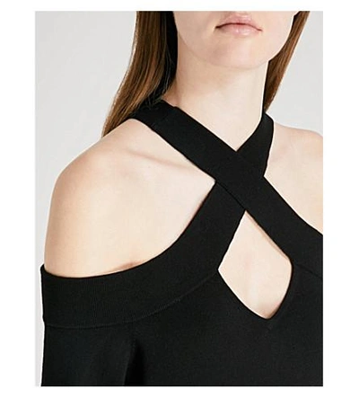 Shop Karen Millen Cross-over Cold-shoulder Jersey Top In Black