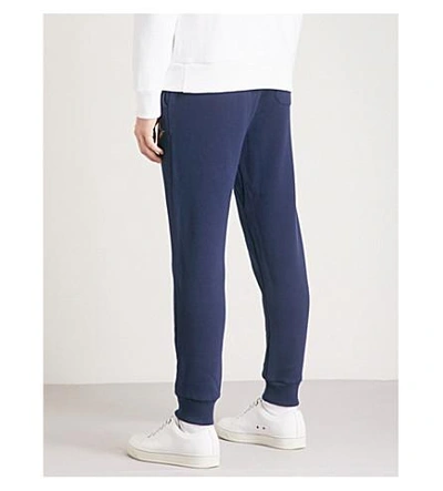Shop Polo Ralph Lauren Cross Flags Skinny Stretch-cotton Jogging Bottoms In Cruise Navy