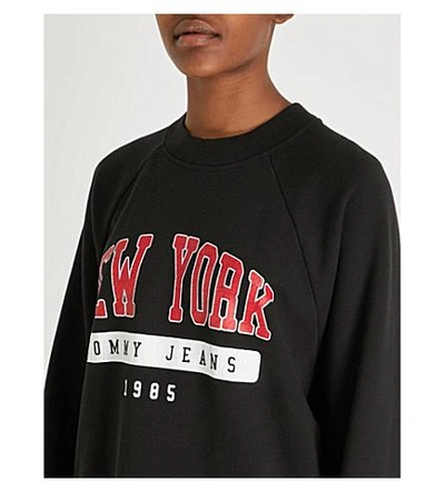 Shop Tommy Jeans New York-print Oversized Cotton-jersey Sweatshirt In Black