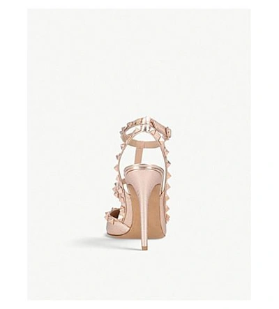 Shop Valentino Rockstud 100 Metallic-leather Courts In Gold