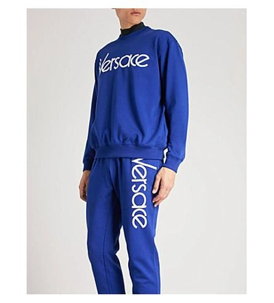 Shop Versace Logo-embroidered Cotton-jersey Sweatshirt In Blue White