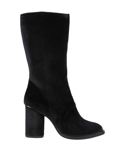 Shop Tipe E Tacchi Boots In Black