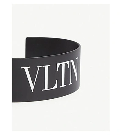 Shop Valentino Vltn Metal Cuff In Black White