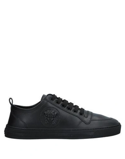 Shop Versace Sneakers In Black