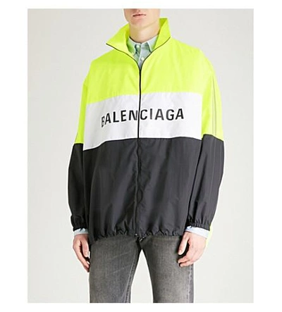 Shop Balenciaga Logo-print Reflective Shell Jacket In Noirjaune