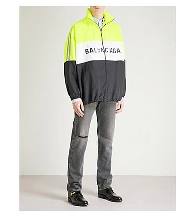 Shop Balenciaga Logo-print Reflective Shell Jacket In Noirjaune
