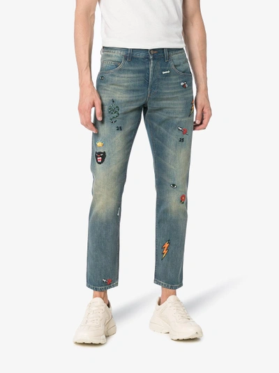 Shop Gucci Tapered Denim Pant With Symbols In Blue