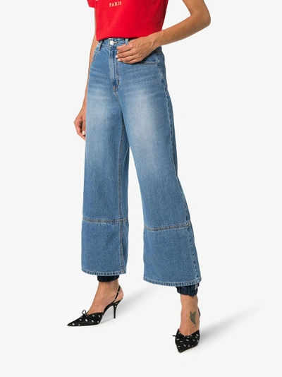 Shop Sjyp Track Pant Hem Jeans In Blue