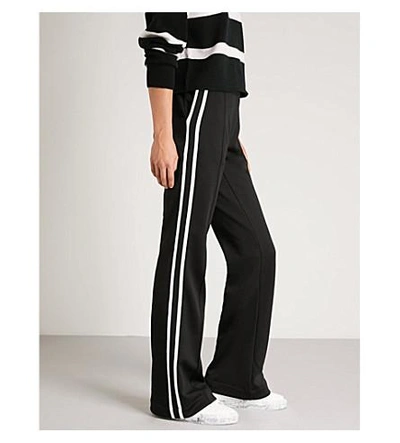 Shop Moncler Striped-side Jersey Jogging Bottoms In Black