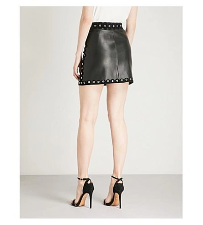Shop Maje Eyelet Trim Leather Mini Skirt In Black