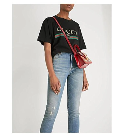 Shop Gucci Logo-print Cotton-jersey T-shirt In Black