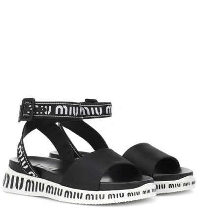 Shop Miu Miu Logo Sandals In Black