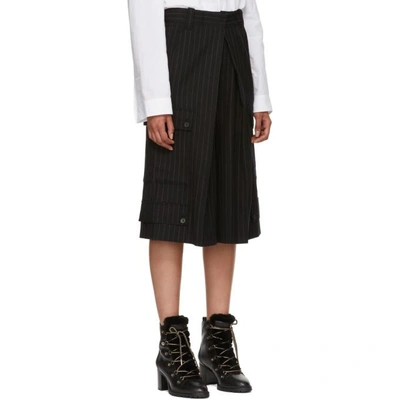 Shop Jw Anderson Black Pinstripe Wide-leg Trousers