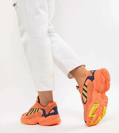 Shop Adidas Originals Yung-1 Sneakers In Orange