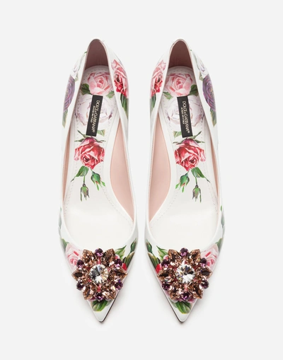 Shop Dolce & Gabbana Printed Patent Leather Pumps With Brooch Detail In Cream