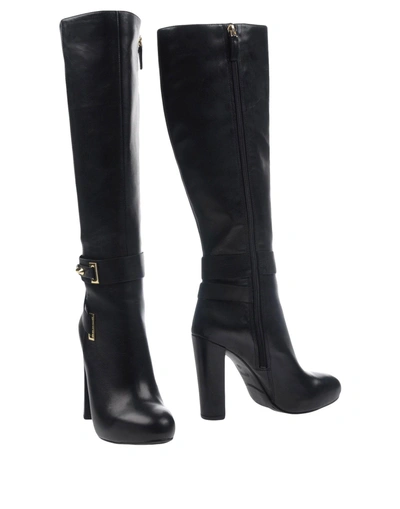 Shop Guess Boots In Black