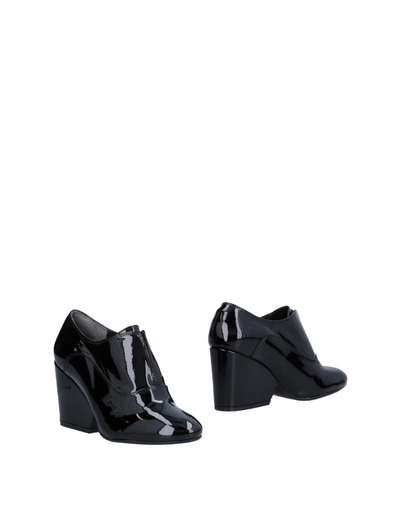 Shop Robert Clergerie Booties In Black