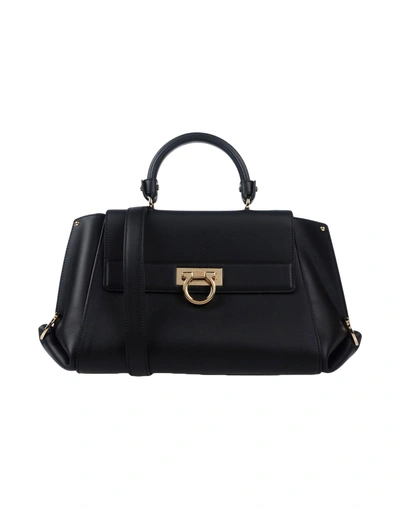 Shop Ferragamo Handbag In Black