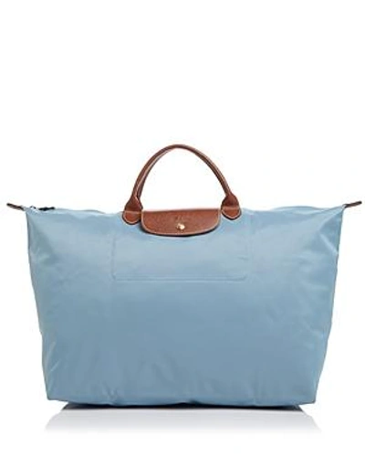 Shop Longchamp Le Pliage Nylon Travel Bag In Arctico Blue/gunmetal/gold