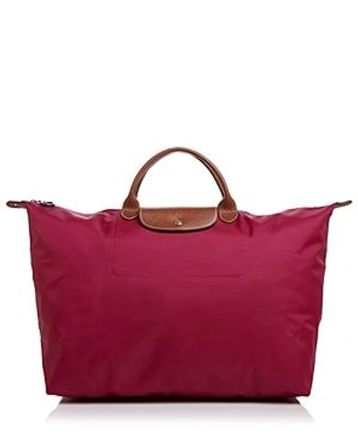 Shop Longchamp Le Pliage Nylon Travel Bag In Dahlia/gunmetal/gold