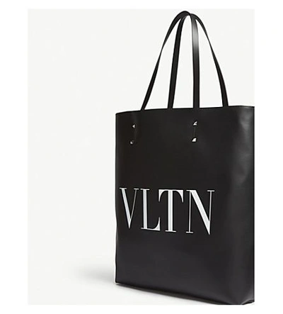 Shop Valentino Black And White Vltn Leather Tote Bag In Black White