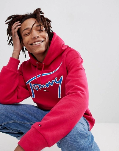 Shop Tommy Jeans Signature Capsule Logo Front Hoodie Relaxed Fit In Bright Pink - Pink