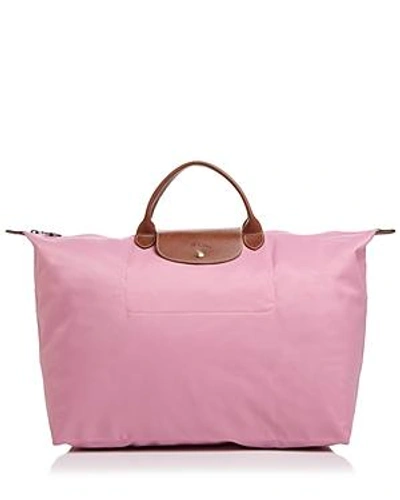 Shop Longchamp Le Pliage Nylon Travel Bag In Pink/gunmetal/gold
