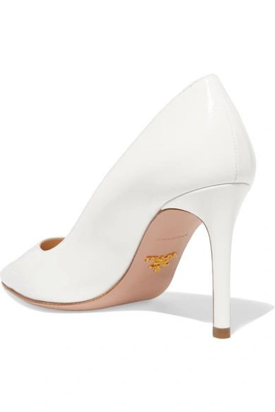 Shop Prada 85 Glossed Textured-leather Pumps In White