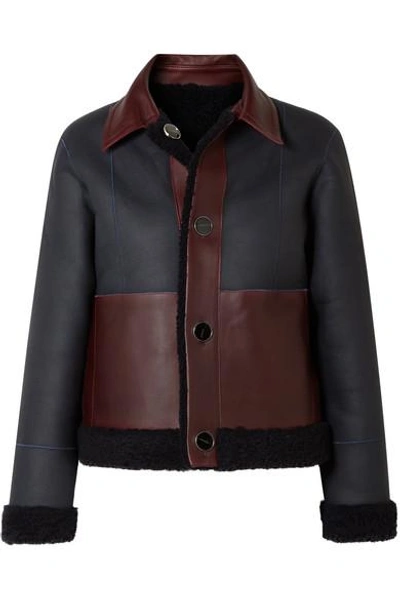 Shop Victoria Victoria Beckham Reversible Shearling Jacket In Midnight Blue